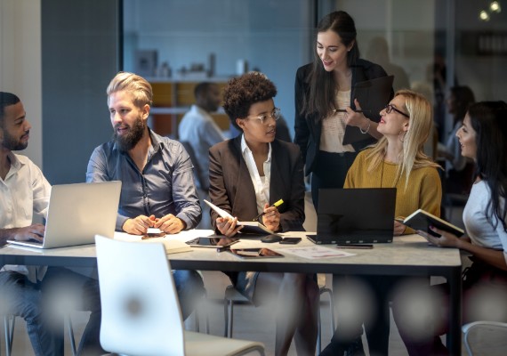 group of coworkers working together in a conference room